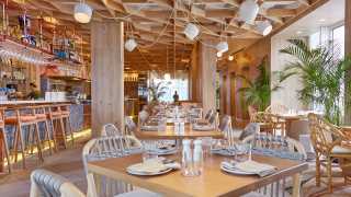 The Bisha Hotel Toronto | The interior of KŌST rooftop restaurant