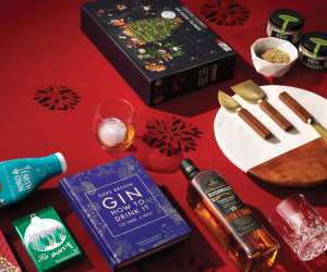 Food and drink holiday Christmas gifts | A flat lay of holiday-themed gifts