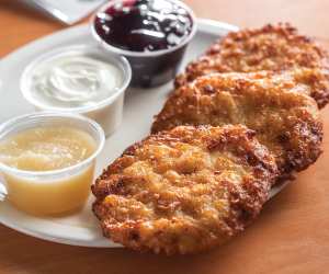 Toronto's best latkes | A plate of latkes with dips from United Bakers