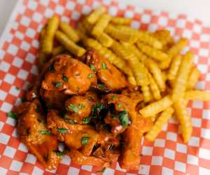 The best new restaurants in Toronto | Betty's chicken wings from the newly opened CoMMO Kitchen