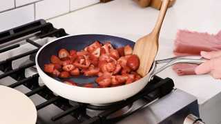 Kilne Everything Pan with strawberries making a meringue