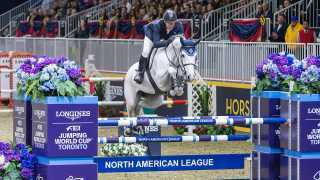 Q&A with Michael Bonacini | A horse clears a jump at the The Royal Agricultural Winter Fair