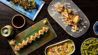 Chotto Matte | Beautiful vegan sushi, ceviche and broccolini on plates and a dining table