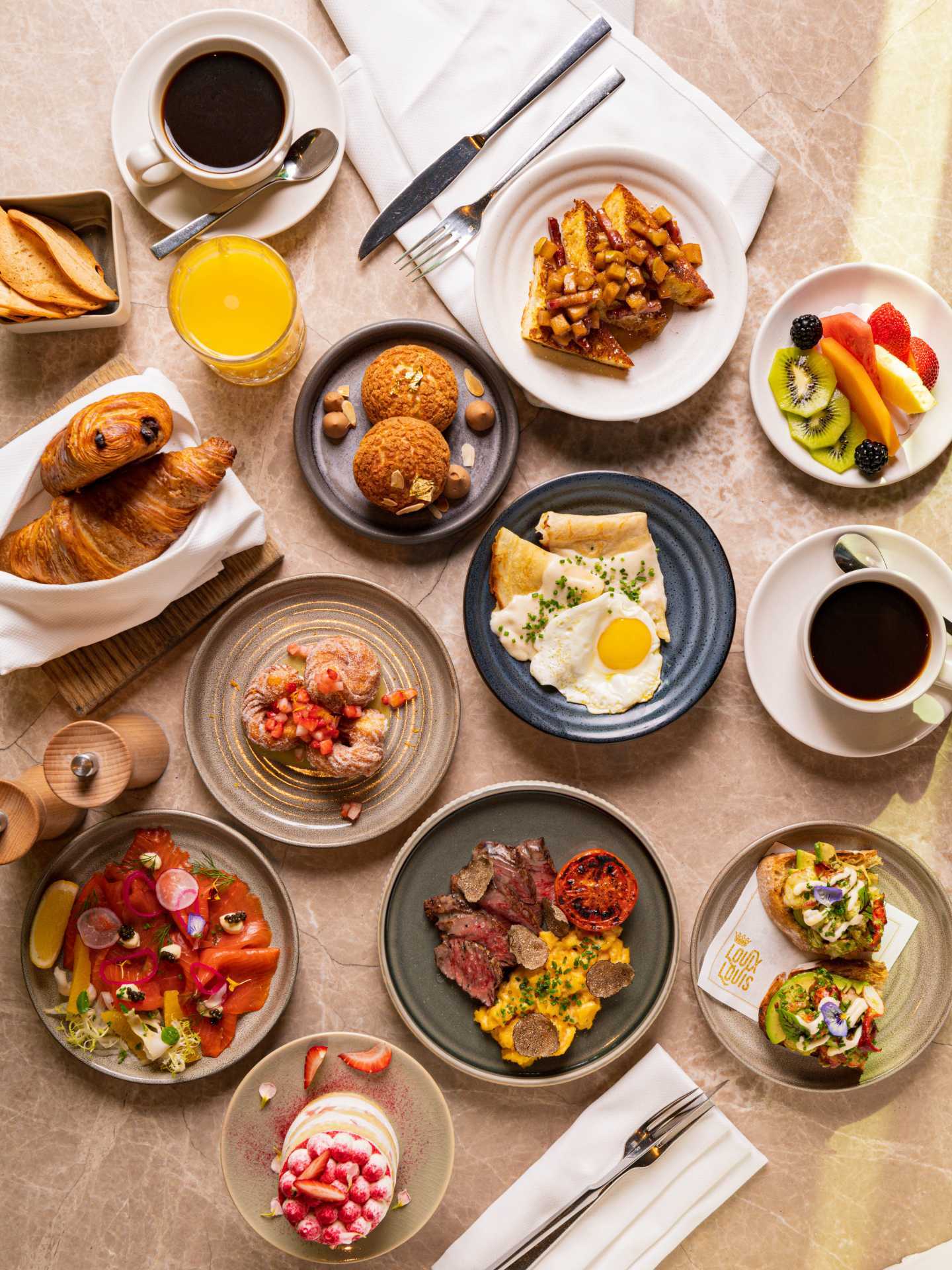 Best brunch in Toronto | A spread of brunch dishes at Louix Louis