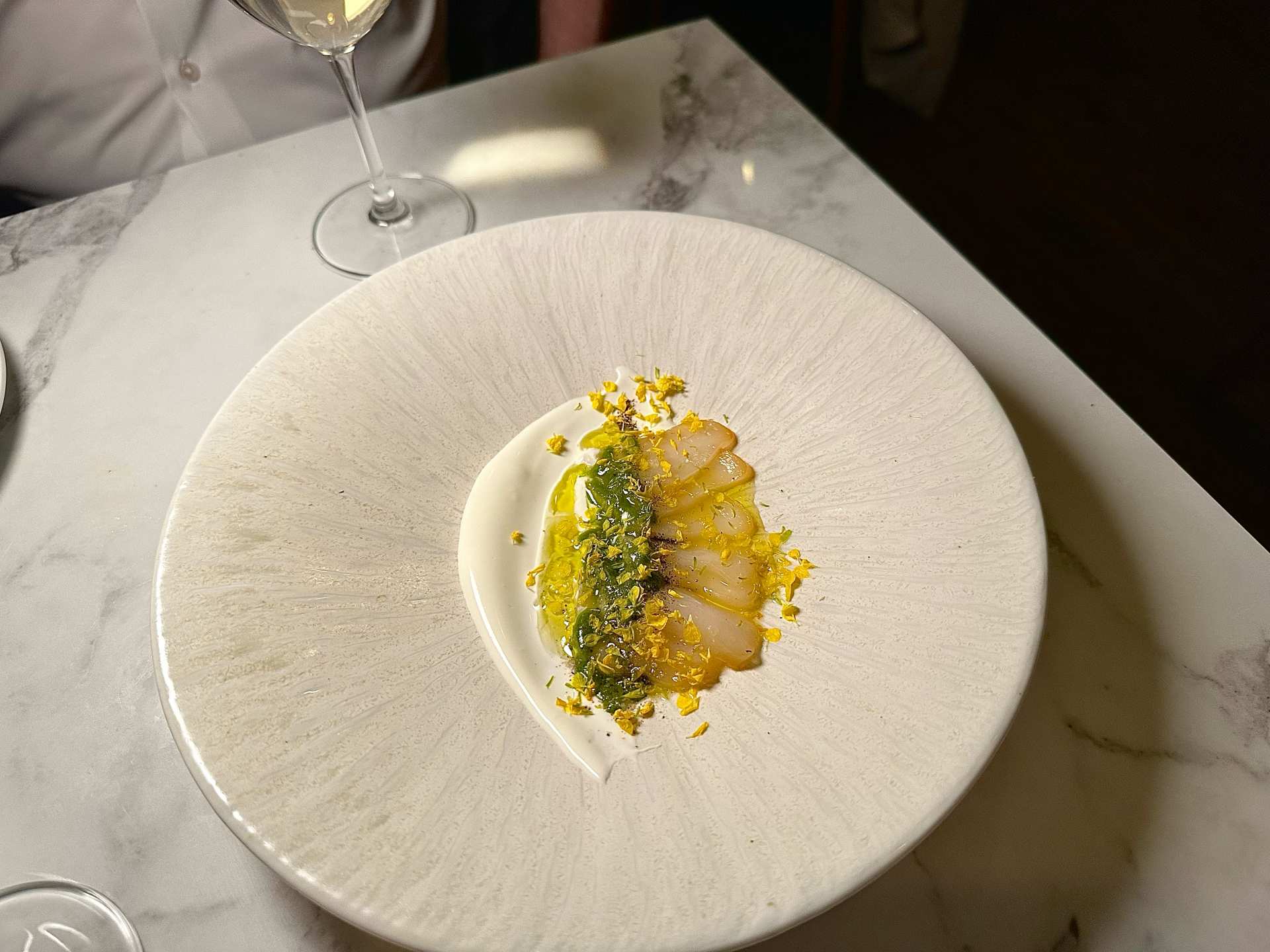 Smoked scallop crudo at The Hamptons restaurant in Toronto