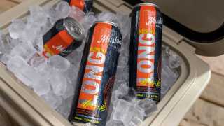 Several cans of the Muskoka Long Drink in a cooler full of ice