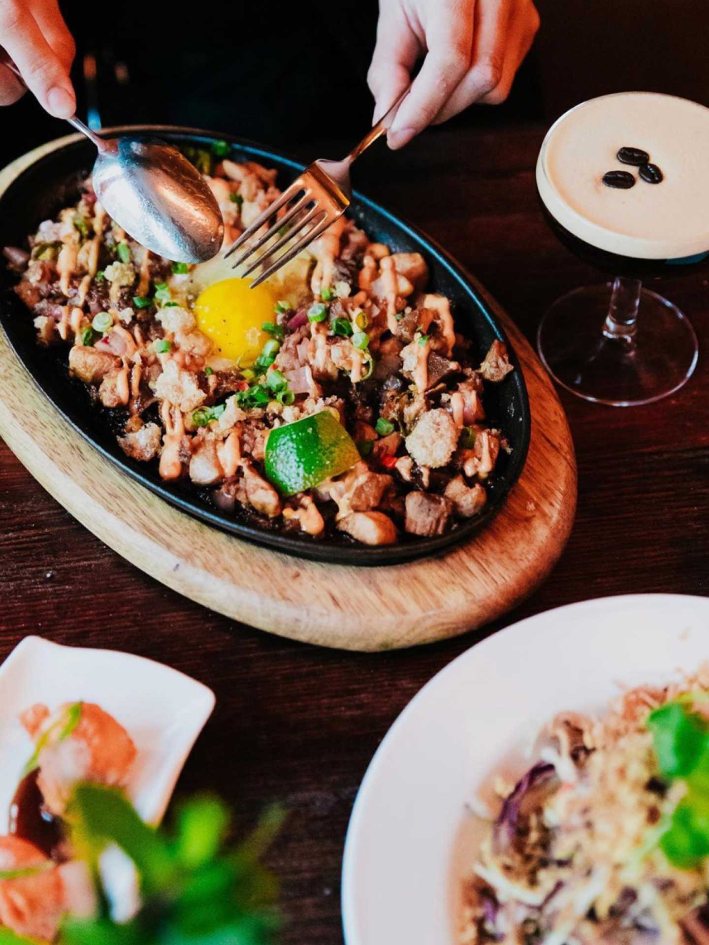 Filipino restaurants Toronto | Dishes and an espresso martini at Islas Filipino BBQ and Bar