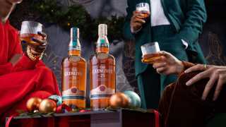 The Glenlivet | A bottle of The Glenlivet 21 and 25 Year Old on a festive table