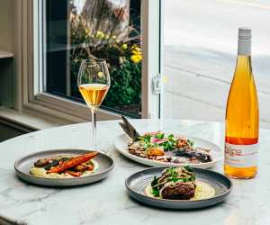 Taline Toronto | A spread of fish, Ontario lamb and orange wine inside Taline's dining room