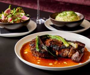 Aera restaurant | A spread of U.S. Prime Rib Eye, mashed potatoes and brussels sprouts