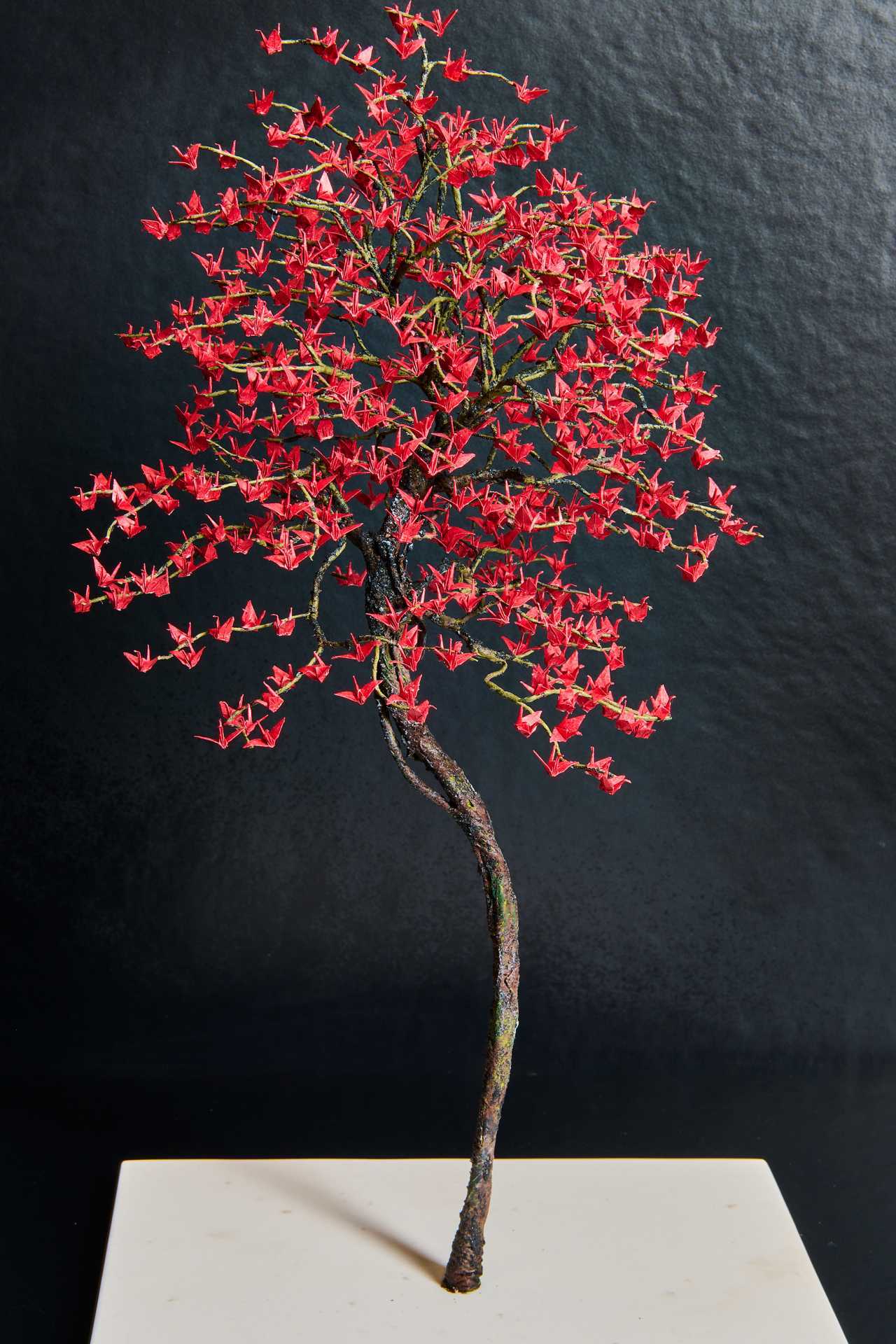 Sushi Yugen omakase in Toronto | A tree sculpture with hand-folded cranes